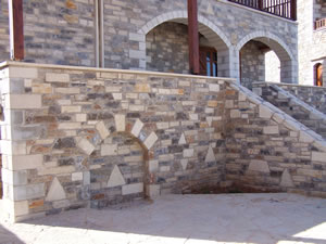 Detail showing the stonework terrace wall and stairs.