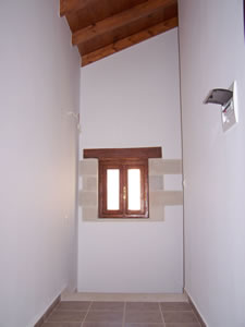 Upper hallway leading from stairs to bedrooms.