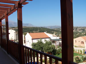 Upper floor terrace with view across Vamos.