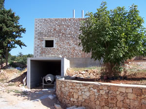 Stone wall and basement garage
