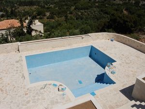 Swimming pool and extensive patio area