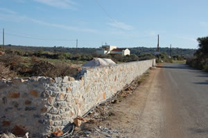 Stone boundary wall.
